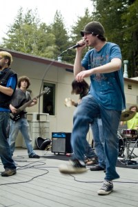porterpalooza2 Despite the rain, Kresge first-year Vinnie Bryne was able to rock out at Porterpalooza ‘09. The annual event took place last Saturday outside the Porter I-Lounge. Photo by Olivia Irvin.