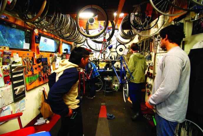 WEB*USEME8 Tucked between tall redwoods, the Bike Co-op allows students to go green without spending green. Photo by Devika Agarwal.