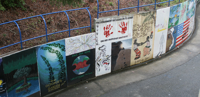 *WEB_MerrillMurals Every year, 10 of the 87 murals on the Merrill Moat wall are replaced with new and original student artwork. Photo by Nita-Rose Evans.