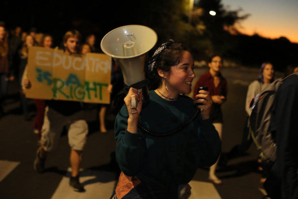 Students marched on Nov. 24 against the tuition increase plan. Photo by Stephen De Ropp
